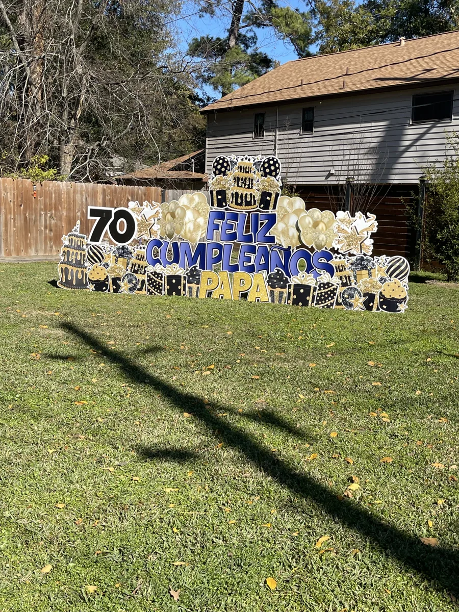 Birthday yard sign display with festive colors and large celebration letters
