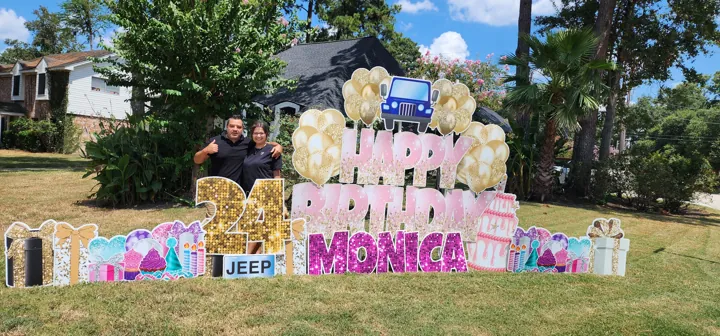 Premium yard sign display with colorful add-ons and custom message